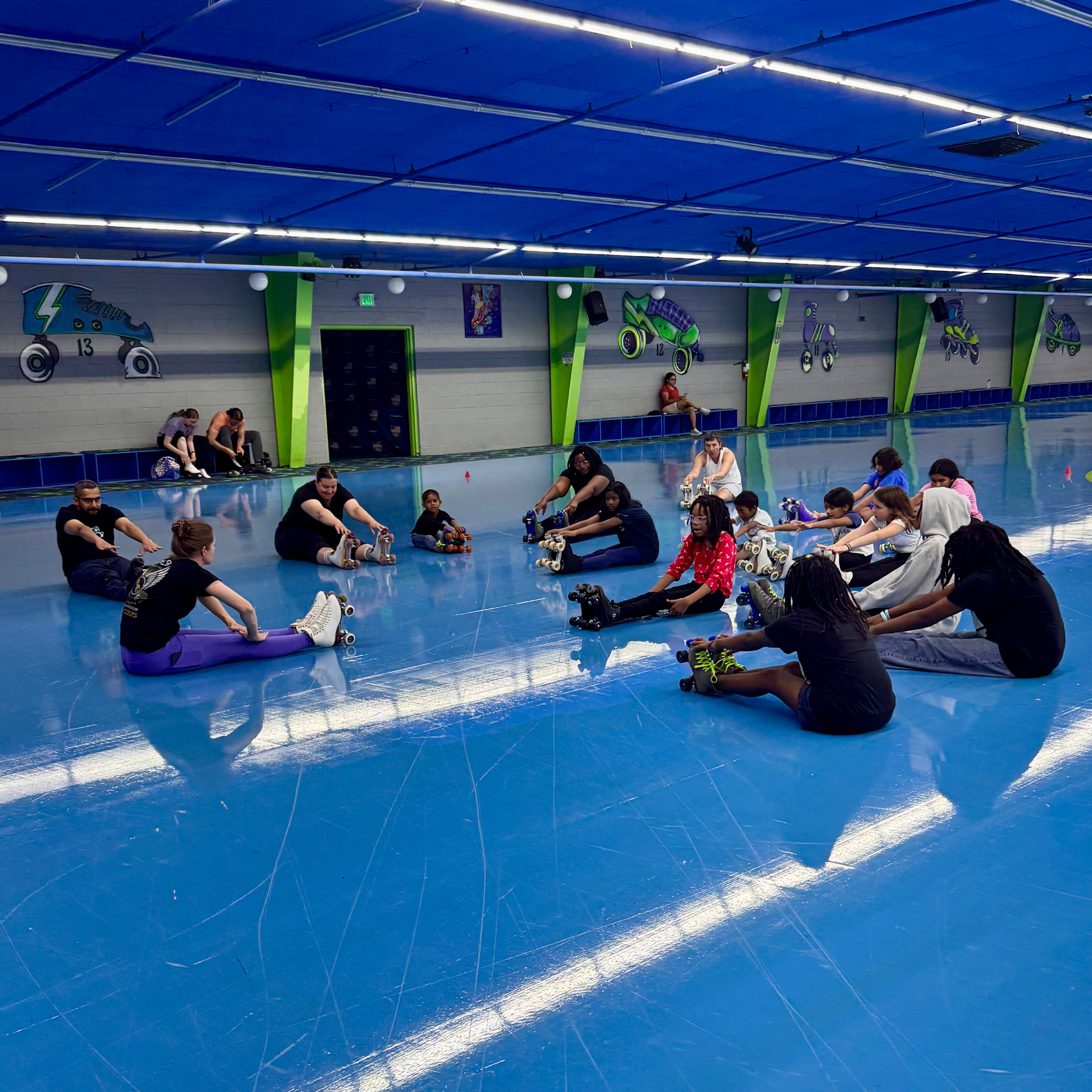 Learn to skate class, group class stretching together, Roller skating, Denver Colorado, mile high artistic skating club
