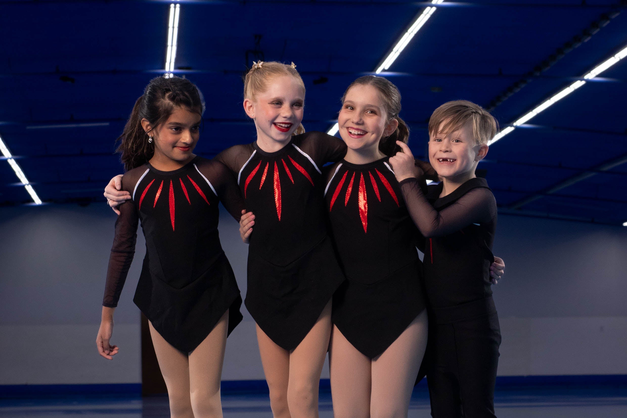 Kids having fun roller skating, learn to skate class, fun roller skating, family fun roller skating, kids laughing while roller skating